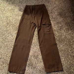 brown cargo pants with one pocket on the left leg